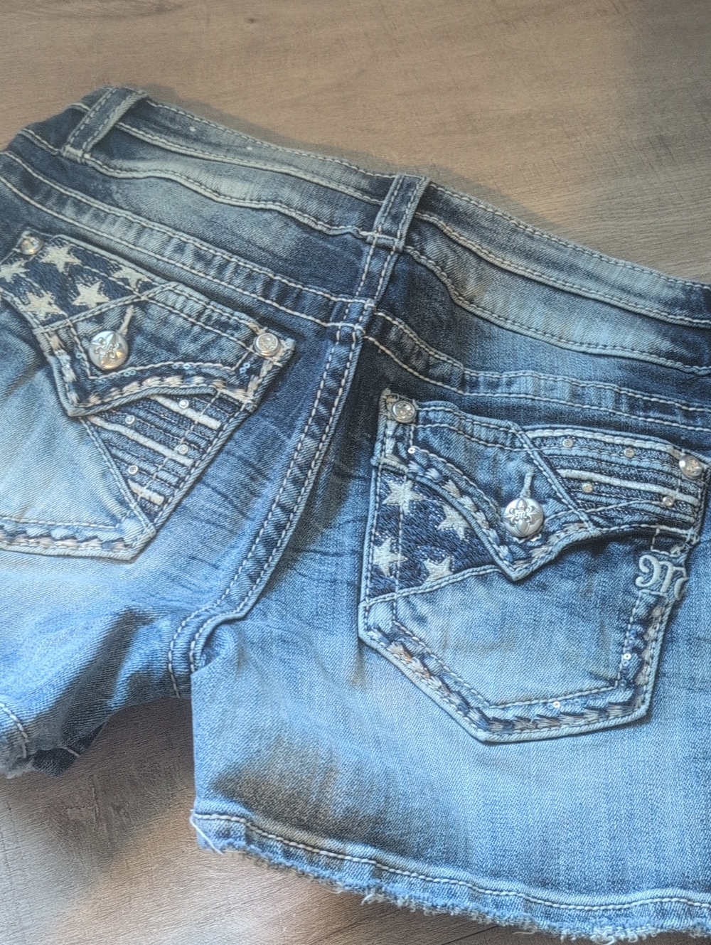 Miss Me Blue Washed 28 Denim Shorts w/ Patriotic Flag & Rhinestone Accents